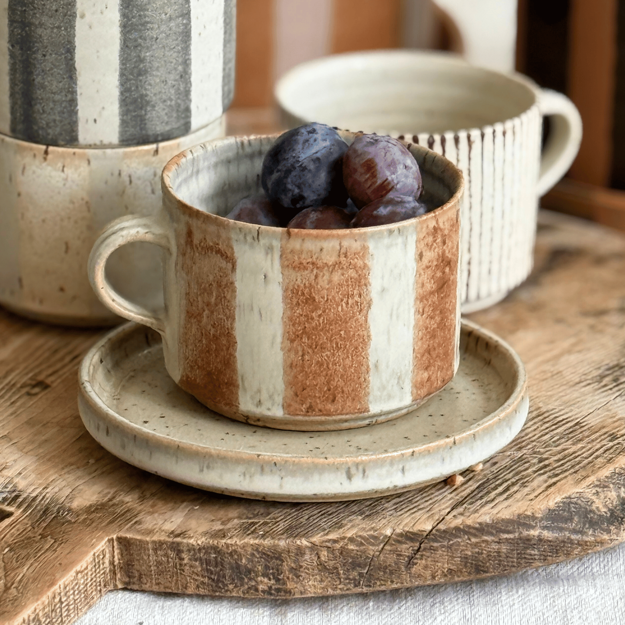 Bredrandig kaffekopp havre/brun